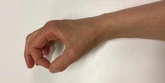 En hånd sætter tommelfingerens spids og pegefingerens spids mod hinanden