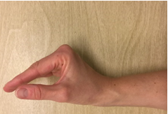 Hånd som bøjer i grundleddene med strakte fingre
