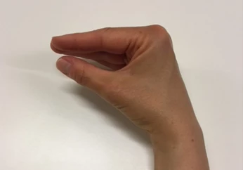 Hånd der viser øvelsen