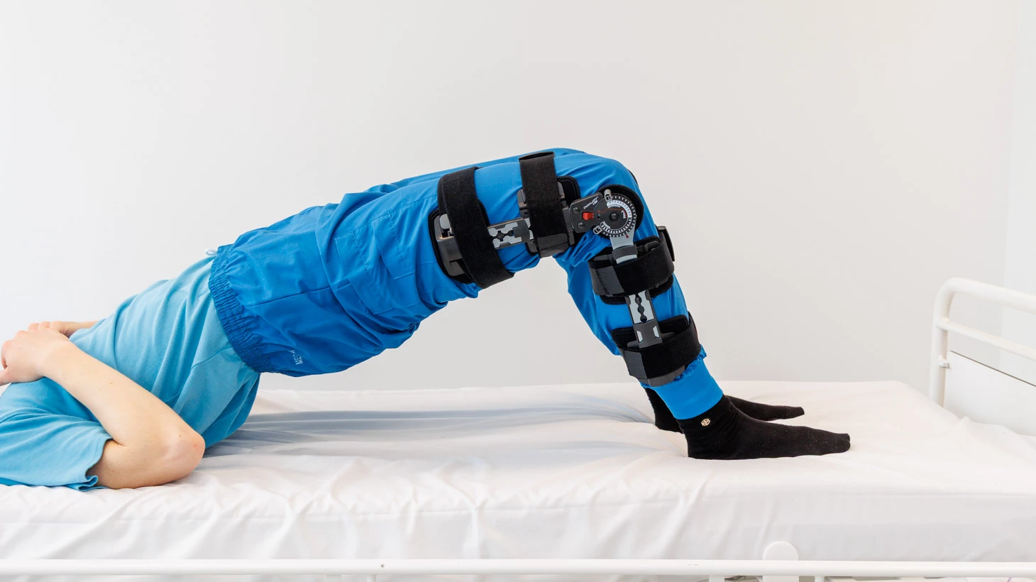 Billede af person der ruller ryggen op